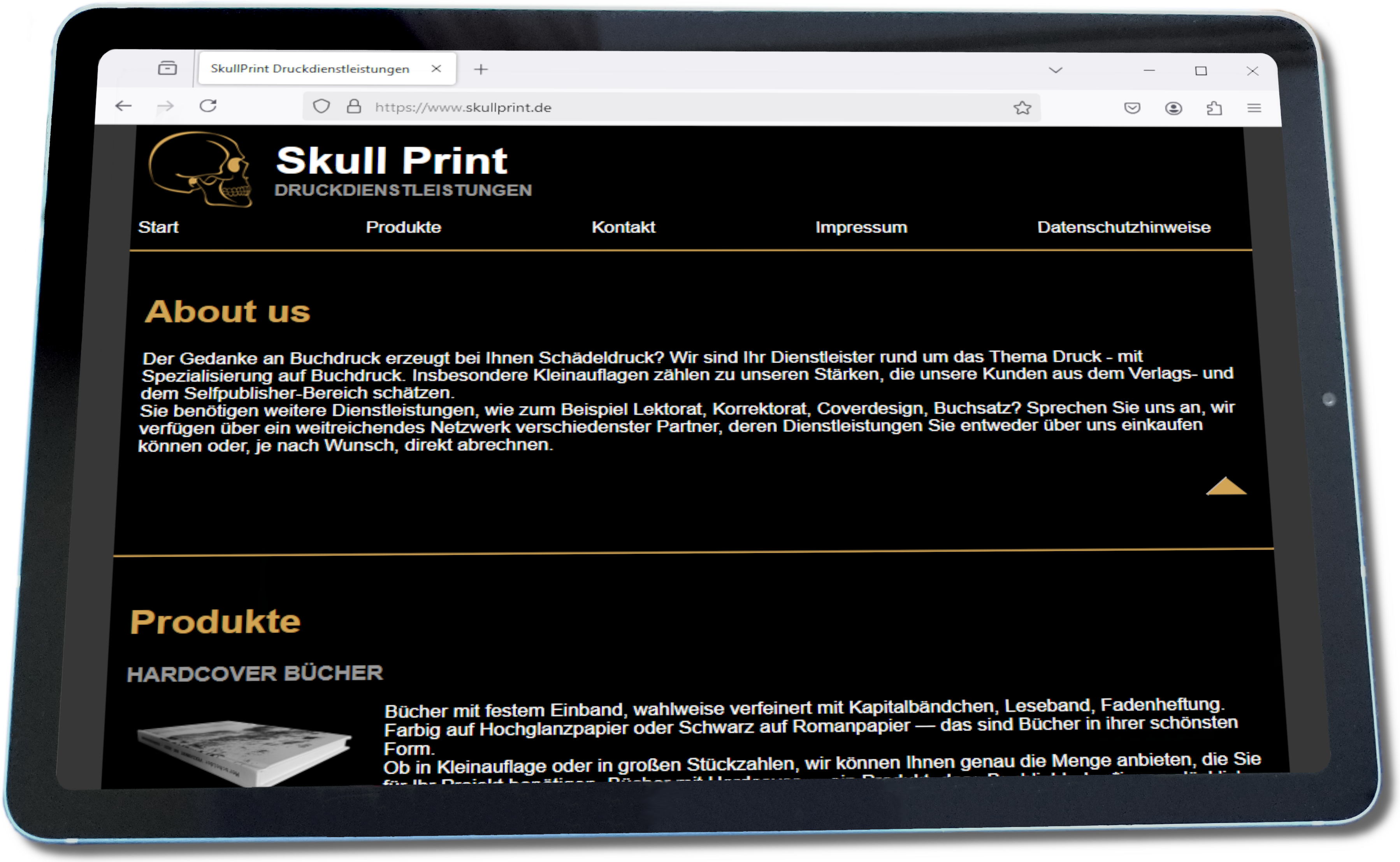 Tablett mit geöffneter Website des Skull Print Druckservices